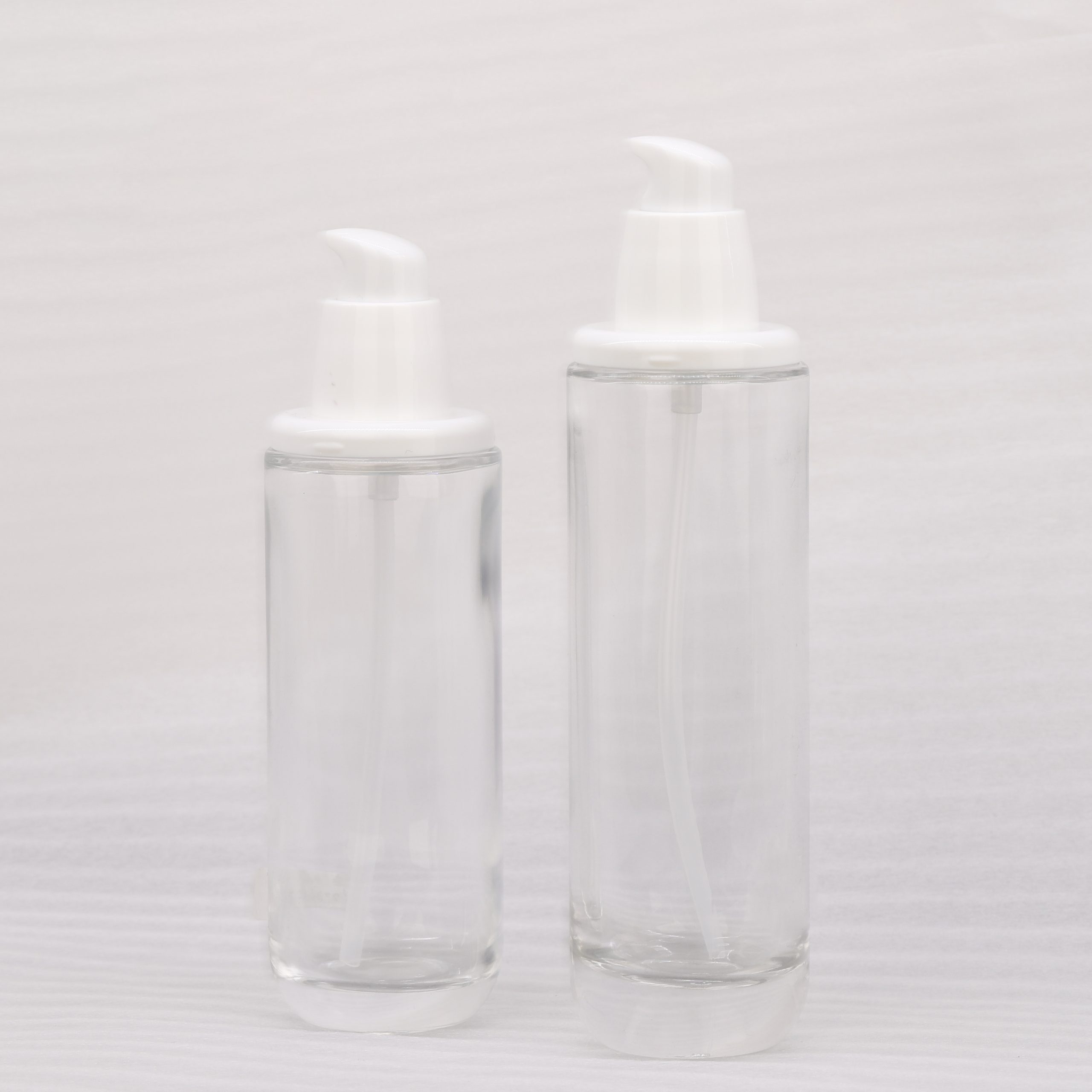 Empty Glass Skincare Packaging 100ml 120ml Clear Glass Serum Lotion Pump Bottle With Gold Cap